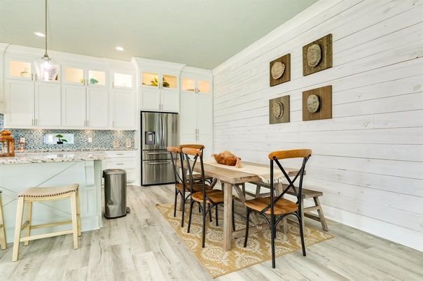 Dining room, Interior, Kitchen, Pendant Lights, Recessed Lighting, Stainless Steel Appliances, Wood Texture Flooring
