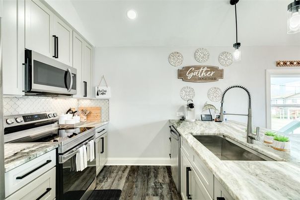 Interior, Kitchen, Pendant Lights, Recessed Lighting, Stainless Steel Appliances, Wood Texture Flooring