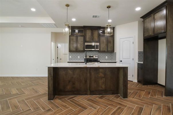 Interior, Kitchen, Pendant Lights, Recessed Lighting, Stainless Steel Appliances, Wood Texture Flooring