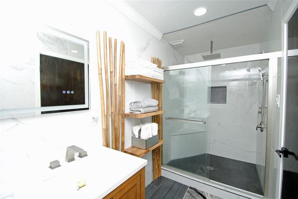 Bathroom, Glass Shower, Interior, Marble Walls, Recessed Lighting, Wood Texture Flooring