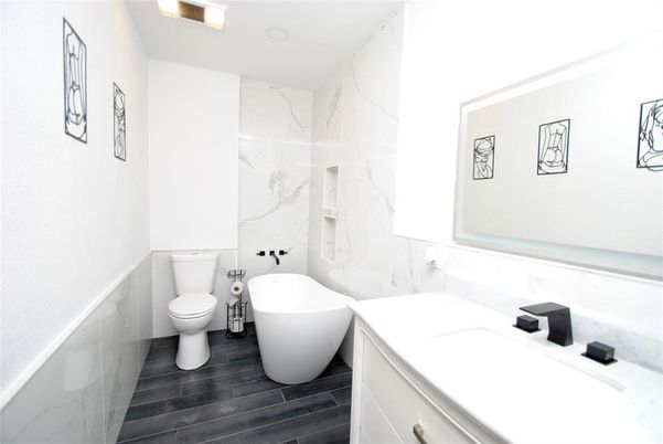 Bathroom, Free Standing Baths, Interior, Marble Walls, Wood Texture Flooring