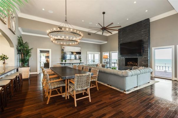 Chandelier, Dining room, Fireplace, Interior, Living room, Pendant Lights, Recessed Lighting, Water, Wood Texture Flooring