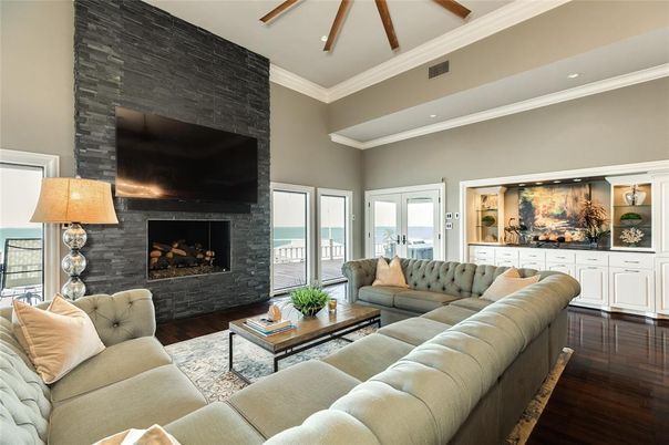 Fireplace, Interior, Living room, Recessed Lighting, Water, Wood Texture Flooring