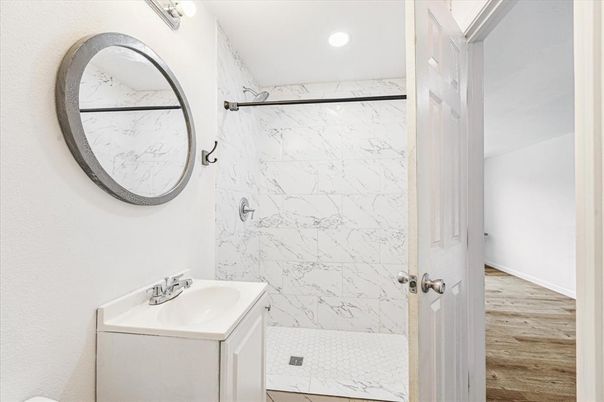 Bathroom, Interior, Marble Walls, Recessed Lighting, Wood Texture Flooring
