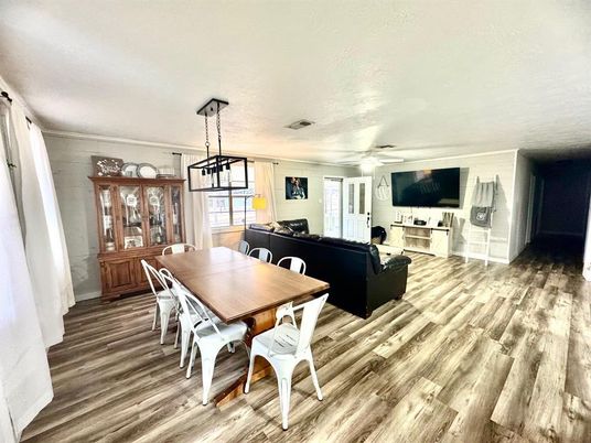Dining room, Fireplace, Interior, Living room, Pendant Lights, Wood Texture Flooring