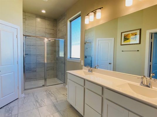 Bathroom, Dual Sink Vanities, Glass Shower, Interior, Marble, Marble Walls, Recessed Lighting
