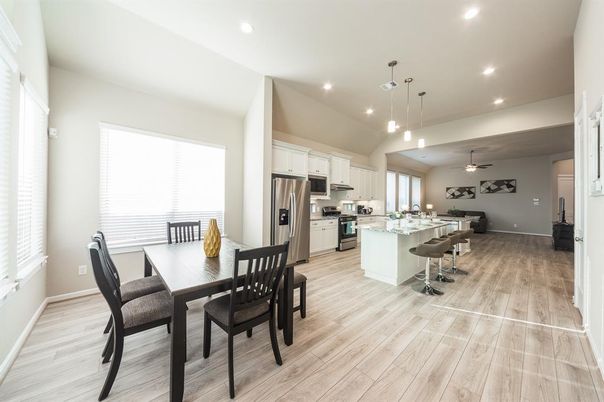 Dining room, Interior, Kitchen, Pendant Lights, Recessed Lighting, Stainless Steel Appliances, Wood Texture Flooring