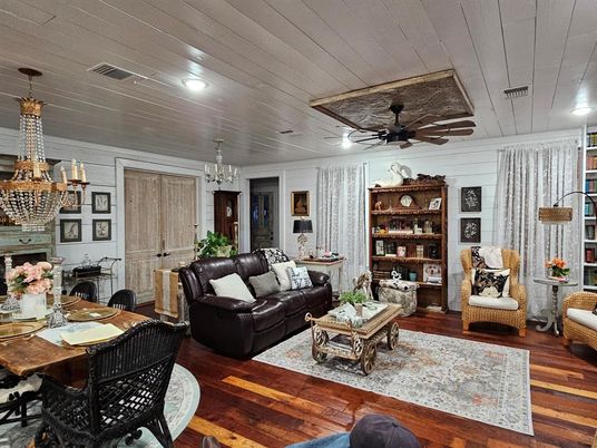 Chandelier, Dining room, Fireplace, Interior, Living room, Recessed Lighting, Wood Texture Flooring
