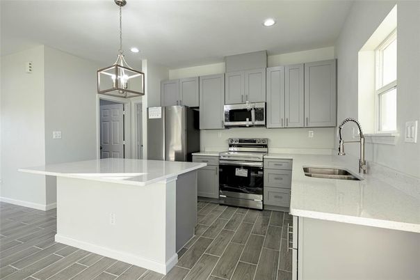 Interior, Kitchen, Pendant Lights, Recessed Lighting, Stainless Steel Appliances, Wood Texture Flooring
