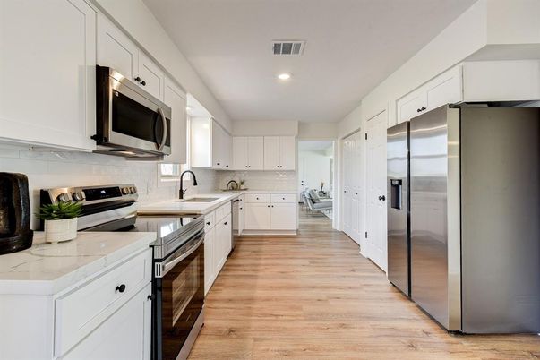 Interior, Kitchen, Recessed Lighting, Stainless Steel Appliances, Wood Texture Flooring