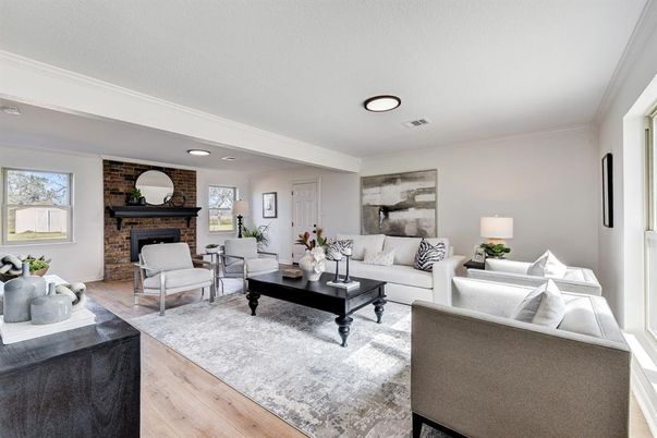 Fireplace, Interior, Living room, Recessed Lighting, Stone Walls, Wood Texture Flooring