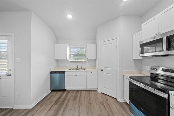 Interior, Kitchen, Recessed Lighting, Stainless Steel Appliances, Wood Texture Flooring