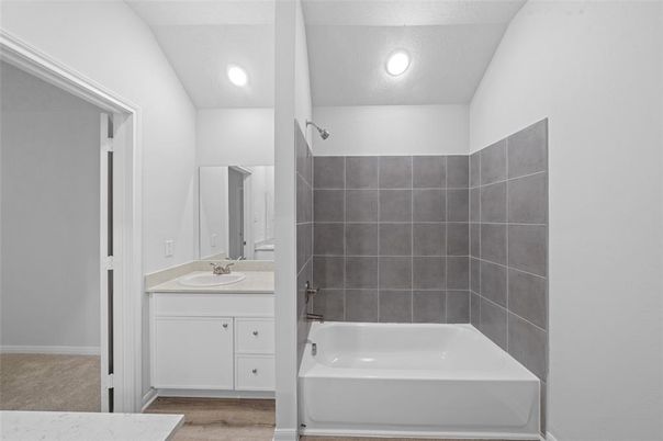 Bathroom, Dual Sink Vanities, Interior, Recessed Lighting, Wood Texture Flooring