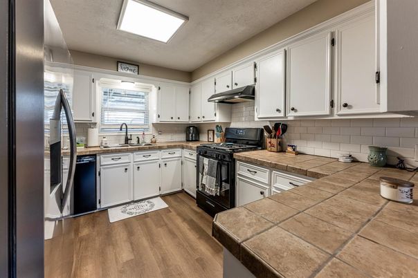 Interior, Kitchen, Tile Countertops, Wood Texture Flooring