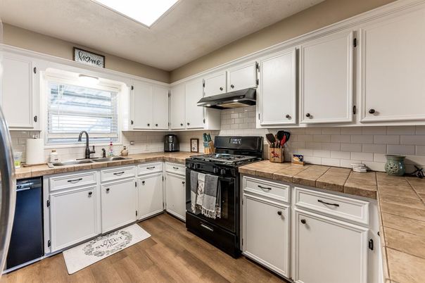 Interior, Kitchen, Tile Countertops, Wood Texture Flooring