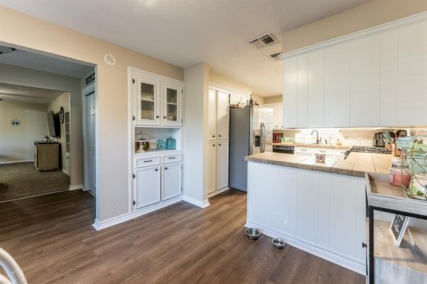 Interior, Kitchen, Tile Countertops, Wood Texture Flooring