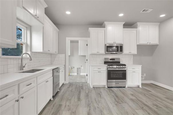 Interior, Kitchen, Recessed Lighting, Stainless Steel Appliances, Wood Texture Flooring
