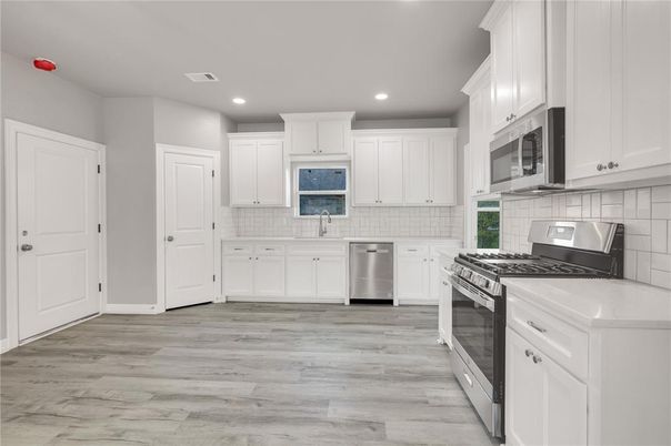 Interior, Kitchen, Recessed Lighting, Stainless Steel Appliances, Wood Texture Flooring