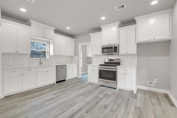 Interior, Kitchen, Recessed Lighting, Stainless Steel Appliances, Wood Texture Flooring