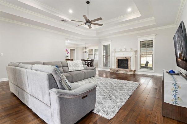 Dining room, Fireplace, Interior, Living room, Pendant Lights, Recessed Lighting, Wood Texture Flooring