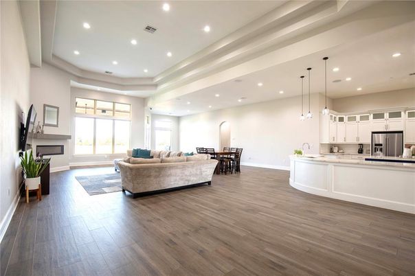 Dining room, Interior, Kitchen, Living room, Pendant Lights, Recessed Lighting, Stainless Steel Appliances, Wood Texture Flooring