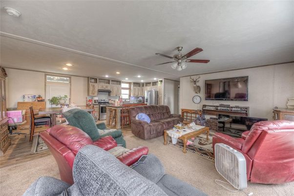 Dining room, Interior, Kitchen, Living room, Recessed Lighting, Stainless Steel Appliances, Wood Texture Flooring