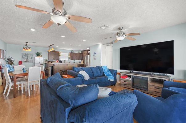 Dining room, Interior, Kitchen, Living room, Pendant Lights, Recessed Lighting, Stainless Steel Appliances, Wood Texture Flooring