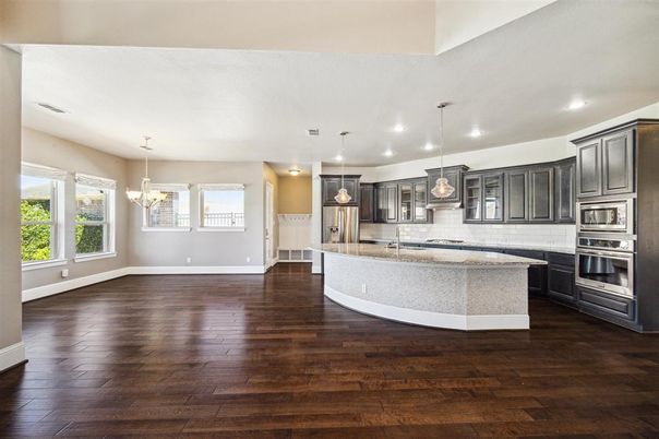 Chandelier, Interior, Kitchen, Pendant Lights, Recessed Lighting, Stainless Steel Appliances, Wood Texture Flooring