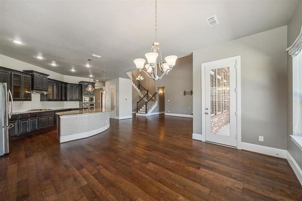 Chandelier, Interior, Kitchen, Pendant Lights, Recessed Lighting, Stainless Steel Appliances, Wood Texture Flooring