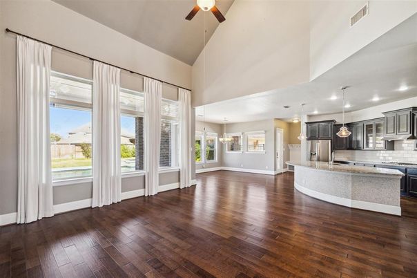 Empty room, Interior, Kitchen, Pendant Lights, Stainless Steel Appliances, Wood Texture Flooring