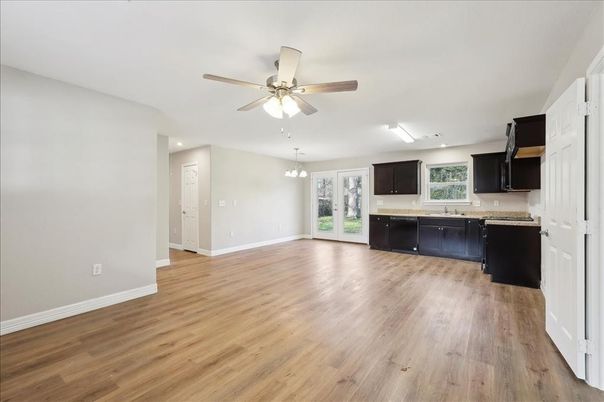 Chandelier, Empty room, Interior, Kitchen, Recessed Lighting, Wood Texture Flooring
