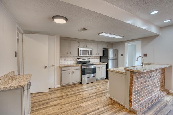 Interior, Kitchen, Recessed Lighting, Stainless Steel Appliances, Wood Texture Flooring