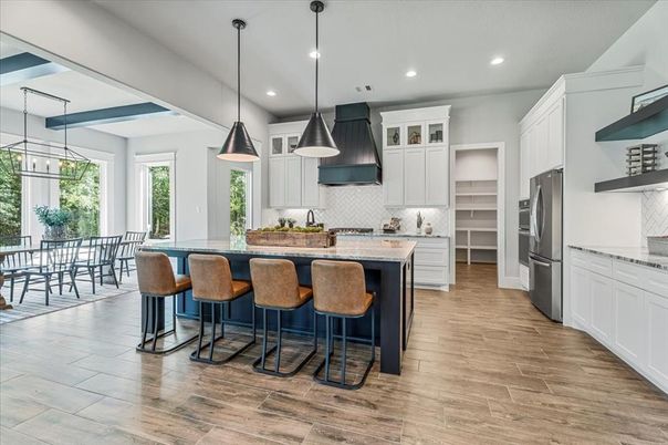 Dining room, Interior, Kitchen, Pendant Lights, Recessed Lighting, Stainless Steel Appliances, Wood Texture Flooring