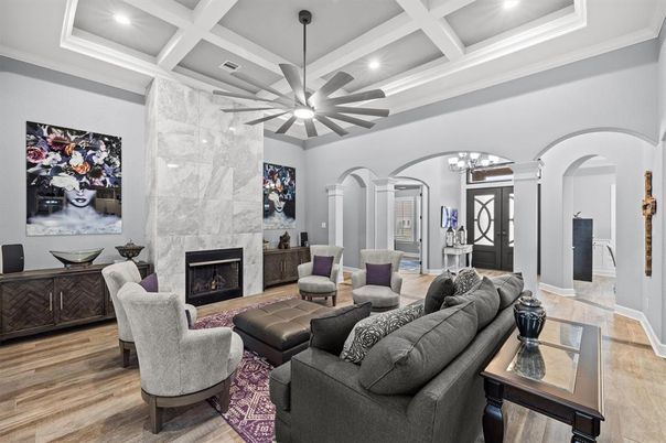 Fireplace, Interior, Living room, Marble Walls, Pendant Lights, Recessed Lighting, Wood Texture Flooring