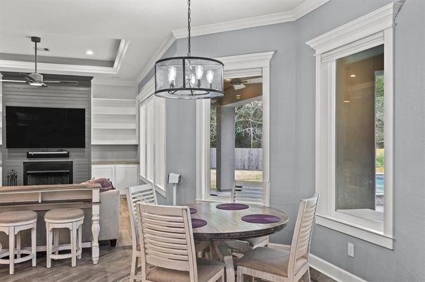 Dining room, Fireplace, Interior, Pendant Lights, Recessed Lighting, Wood Texture Flooring