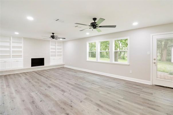 Empty room, Fireplace, Interior, Recessed Lighting, Wood Texture Flooring