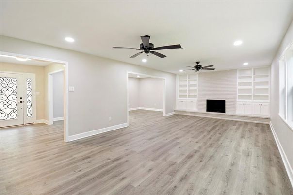 Empty room, Fireplace, Interior, Recessed Lighting, Wood Texture Flooring