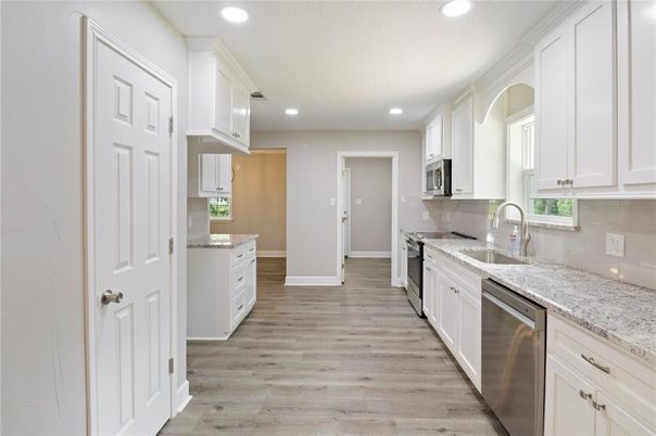 Interior, Kitchen, Recessed Lighting, Stainless Steel Appliances, Wood Texture Flooring