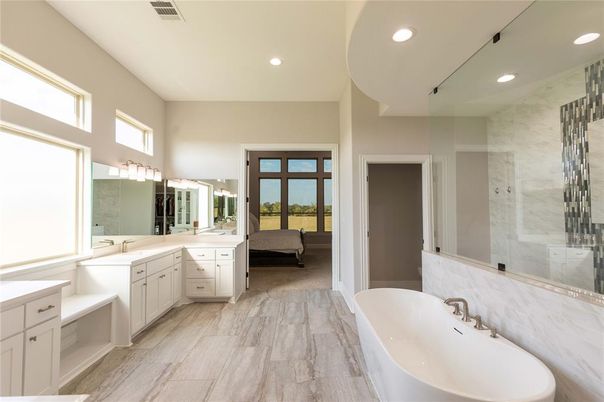 Bathroom, Bedroom, Dual Sink Vanities, Free Standing Baths, Interior, Recessed Lighting, Wood Texture Flooring