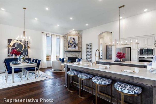 Dining room, Fireplace, Interior, Kitchen, Living room, Pendant Lights, Recessed Lighting, Stainless Steel Appliances, Wood Texture Flooring