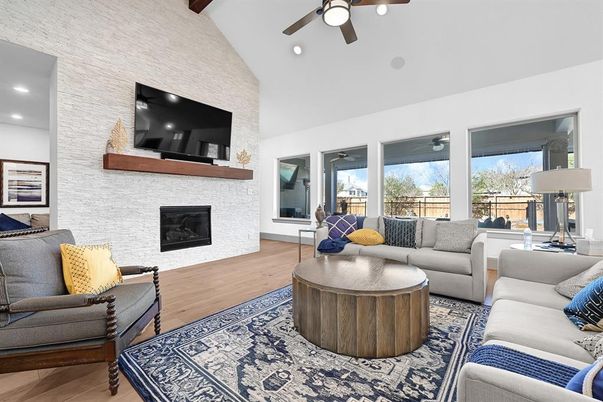 Fireplace, Interior, Living room, Recessed Lighting, Stone Walls, Wood Texture Flooring
