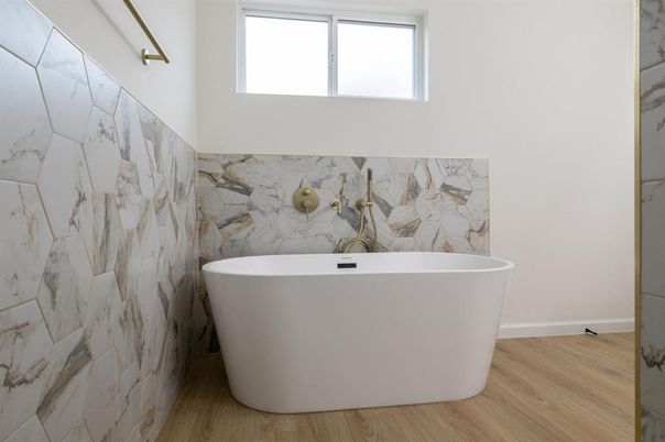 Bathroom, Free Standing Baths, Interior, Marble Walls, Wood Texture Flooring