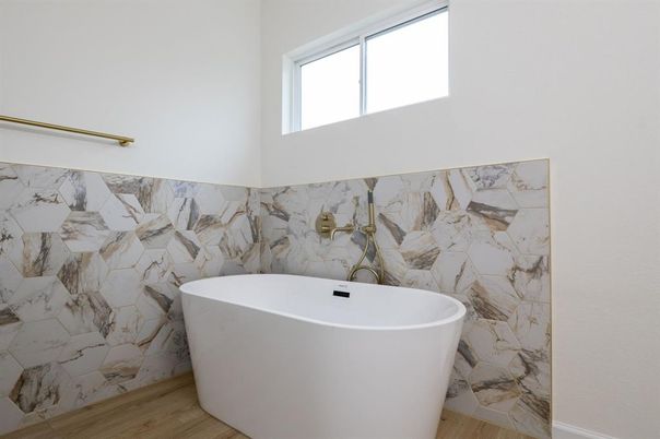 Bathroom, Free Standing Baths, Interior, Marble Walls, Wood Texture Flooring