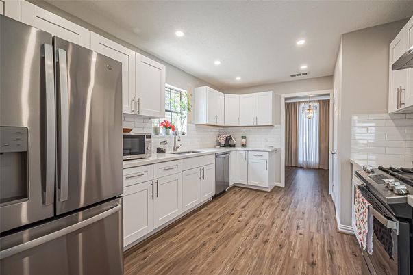 Interior, Kitchen, Pendant Lights, Recessed Lighting, Stainless Steel Appliances, Wood Texture Flooring