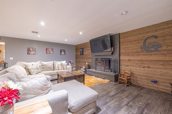 Fireplace, Interior, Living room, Recessed Lighting, Wood Texture Flooring, Wooden Walls