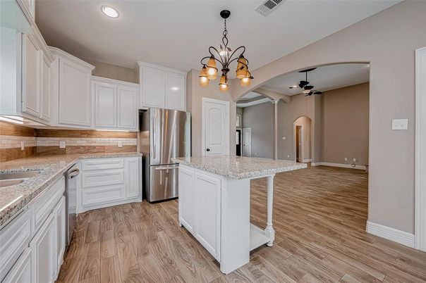 Chandelier, Interior, Kitchen, Pendant Lights, Recessed Lighting, Stainless Steel Appliances, Wood Texture Flooring