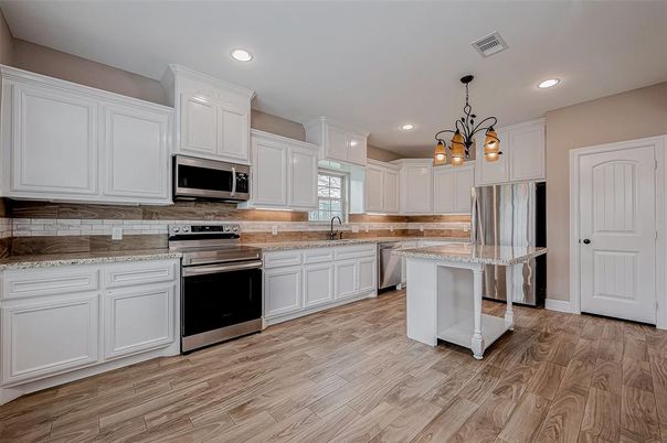 Chandelier, Interior, Kitchen, Recessed Lighting, Stainless Steel Appliances, Wood Texture Flooring