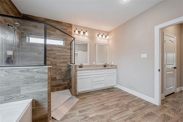 Bathroom, Dual Sink Vanities, Glass Shower, Interior, Recessed Lighting, Wood Texture Flooring