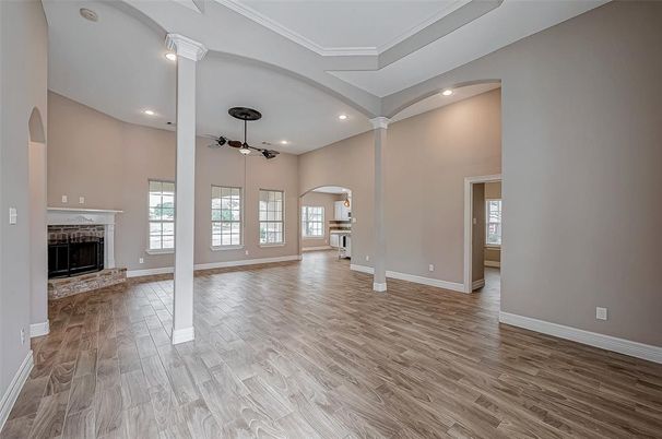Empty room, Fireplace, Interior, Pendant Lights, Recessed Lighting, Wood Texture Flooring