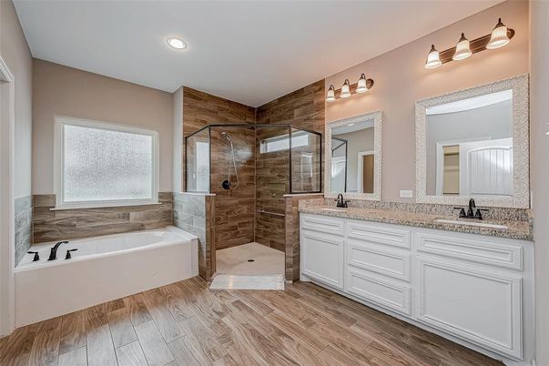 Bathroom, Dual Sink Vanities, Glass Shower, Interior, Recessed Lighting, Wood Texture Flooring